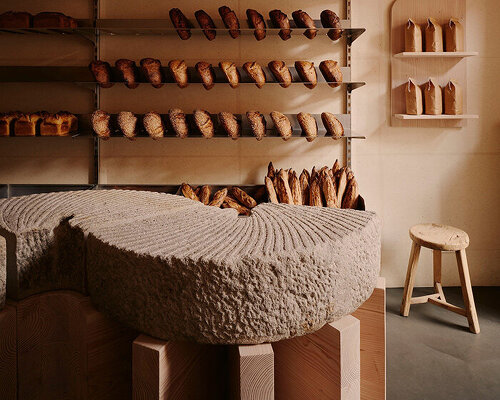 berlin’s KEIT bakery interiors balance rugged stone with soft washi paper